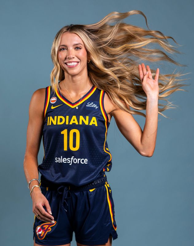 Indiana Fever guard Lexie Hull (10) poses for a photo Wednesday, April 22, 2026, during media day at Gainbridge Fieldhouse in Indianapolis.