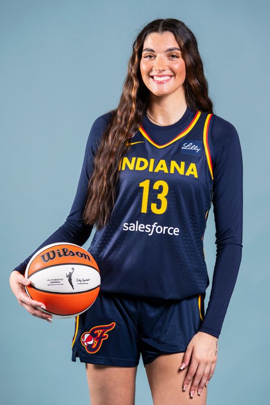 Indiana Fever forward Justine Pissott (13) poses for a photo Wednesday, April 22, 2026, during media day at Gainbridge Fieldhouse in Indianapolis.