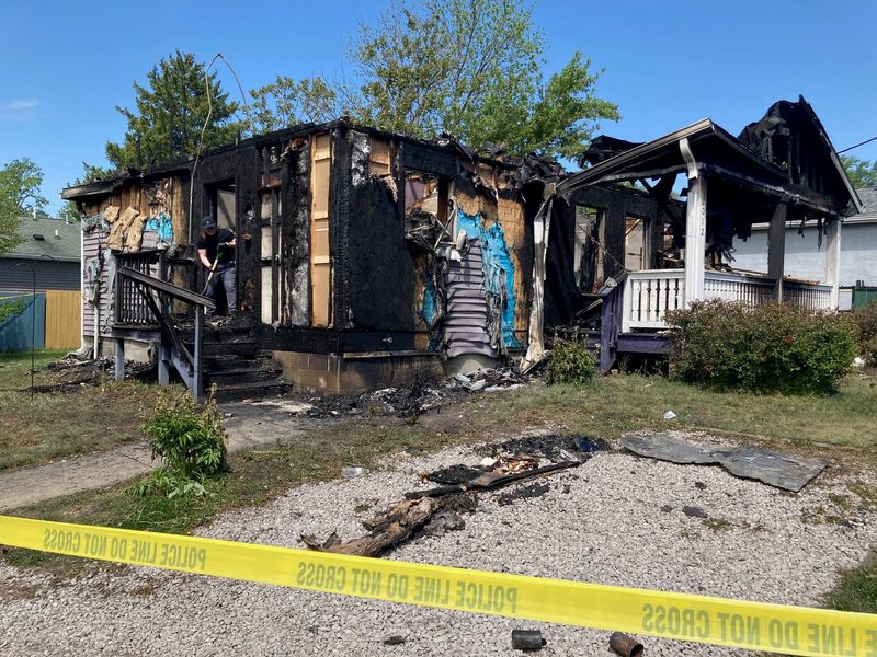 Investigators arrested a 37-year-old man for an April 21 fire that destroyed this house and left his mother seriously injured. The house is on Bloomington's south side, near Switchyard Park. Arson is suspected.