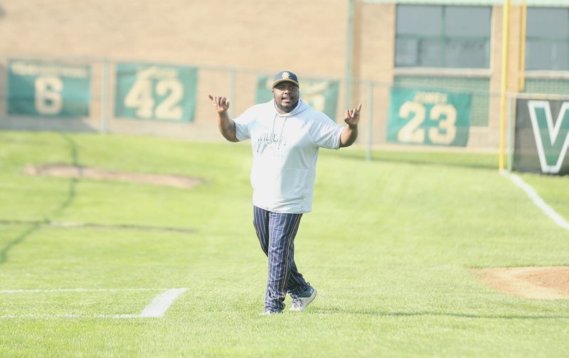 Riley head baseball coach Corey Boyd instructs the batter the during the Wildcats' road game vs. Washington Wednesday, April 22, 2026, in South Bend.