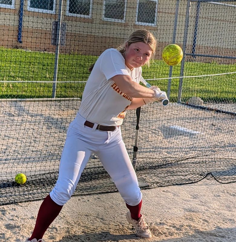 McCutcheon junior catcher Sydney Neumayr takes soft toss at Harrison High School in West Lafayette after a road loss to the Raiders on Wednesday, April 22, 2026.