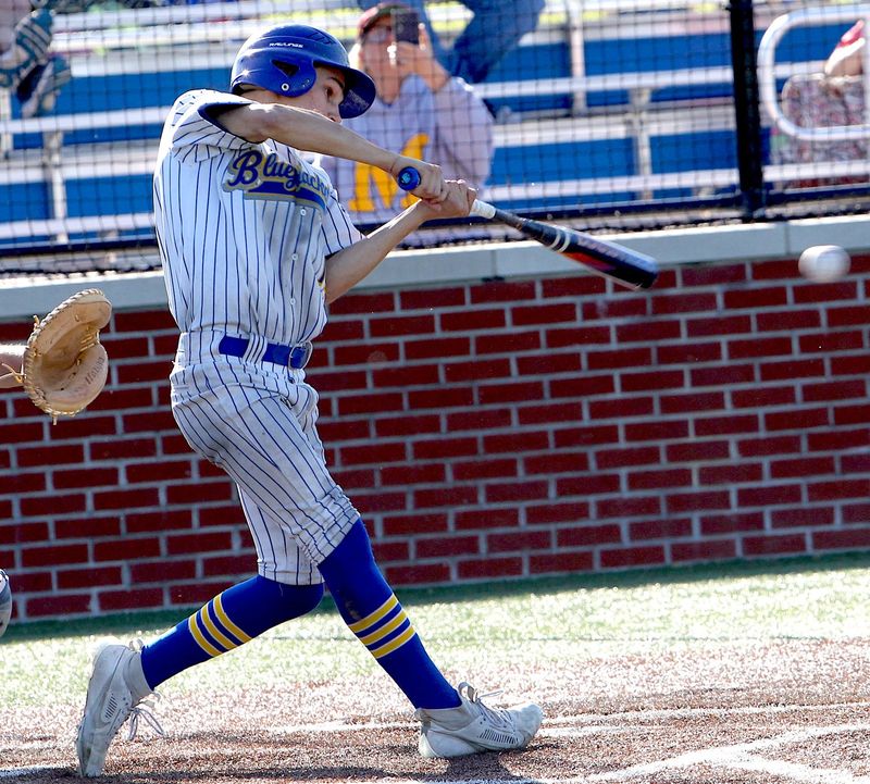 Mitchell's Dasen Kerr (17) makes contact to drive in a run during Mitchell's home matchup with White River Valley Wednesday. Mitchell prevailed 11-1. Mitchell will next next play PLAC foe Perry Central at Perry Central Friday the 24th.