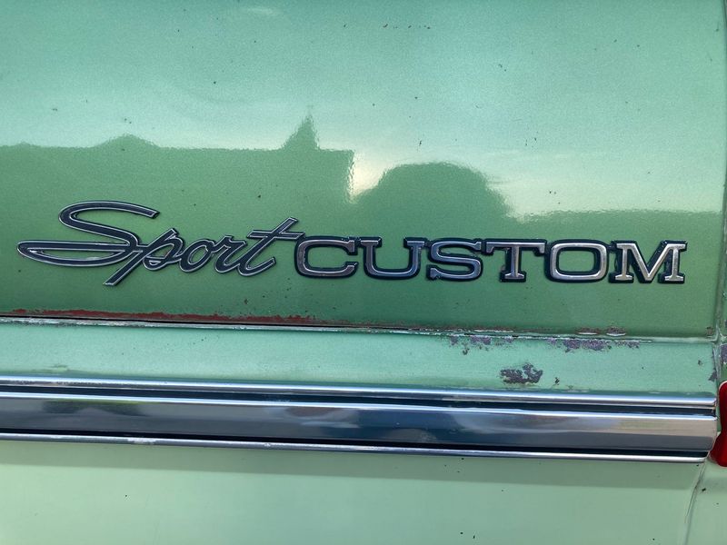 Martinsville's skyline reflected on Jeff Cratty's 1972 Ford Highboy truck.