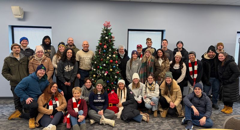 Volunteers from Granger Community Church dig in to help at the Center for the Homeless. Coordinator Maribeth Roncz works with volunteers to find ideal spots.
