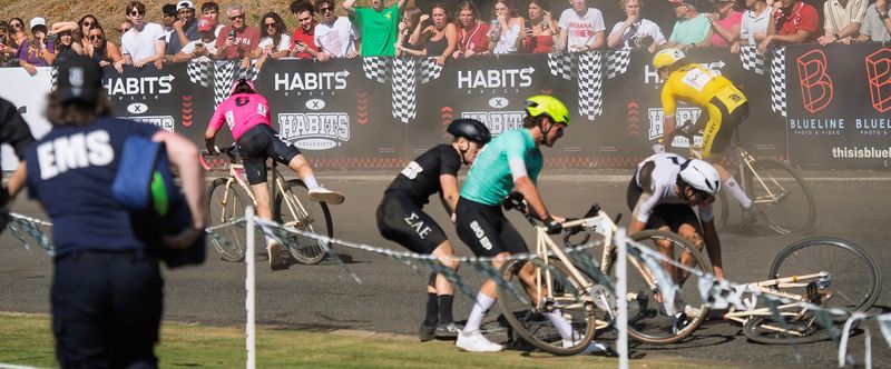 Black Key Bulls, in yellow, goes around the outside of a major crash late in the race as Chi Alpha, in pink, gets back on their back while Sigma Alpha Epsilon, in black, Sigma Phi Epsilon, in teal, and Cutters, in white, scramble for thiers during the men's Little 500 race at Bill Armstrong Stadium on Saturday, April 25, 2026. Black Key Bulls won for the third year in a row.