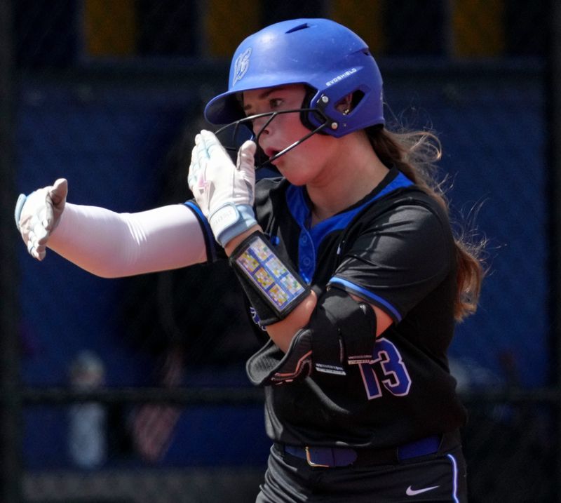 Lake Central Indians' Maddie Such (13) reacts as she rounds the bases after scoring a home run during a Carmel Invitational game on Saturday, April 25, 2026, at Cherry Tree Softball Complex in Carmel.