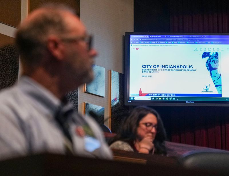 Clif Marsiglio, 54, of Indianapolis, listens Tuesday, April 28, 2026, during a data center presentation listening session at the City-County Building in Indianapolis. Councilors Jesse Brown and Crista Wells hosted the meeting for community members to discuss the data center presentation together.