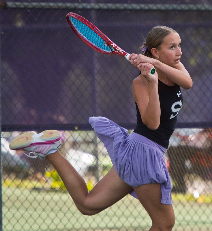 South's Grace Dykstra hits a return during her number two singles match in the Bloomington North versus Bloomington South girl's tennis match at Bloomington High School South on Thursday, April 30, 2026.