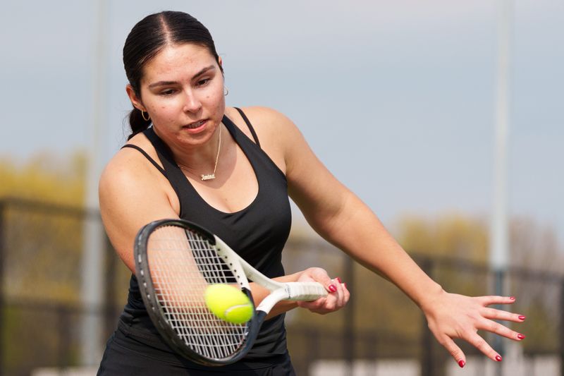 Penn's Amina Spahic hits the ball during a girls tennis match between Penn and Saint Joseph at Penn High School on Thursday, April 30, 2026, in Mishawaka.