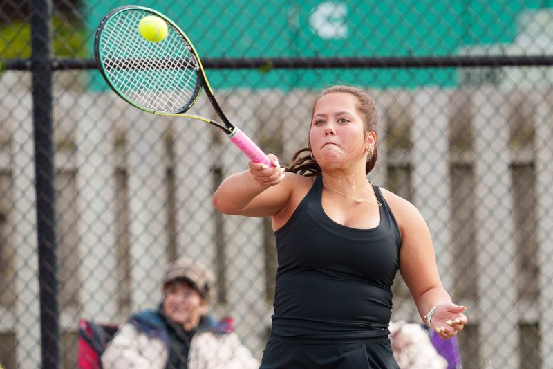 Penn's Mary Kirleis hits the ball during a girls tennis match between Penn and Saint Joseph at Penn High School on Thursday, April 30, 2026, in Mishawaka.