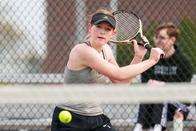 Saint Joseph's Libby Yergler hits the ball during a girls tennis match between Penn and Saint Joseph at Penn High School on Thursday, April 30, 2026, in Mishawaka.