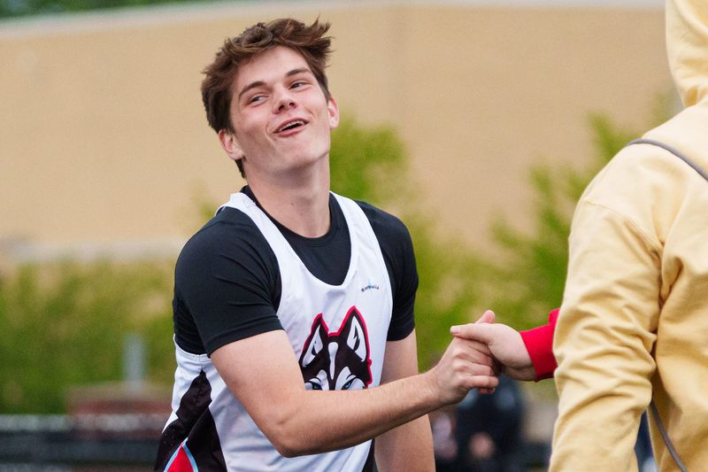 Saint Joseph's Matthew Champlin celebrates after setting a new school pole vault record of 14 feet and 5 inches during the South Bend City Track & Field meet at Saint Joseph High School on Thursday, April 30, 2026, in South Bend.