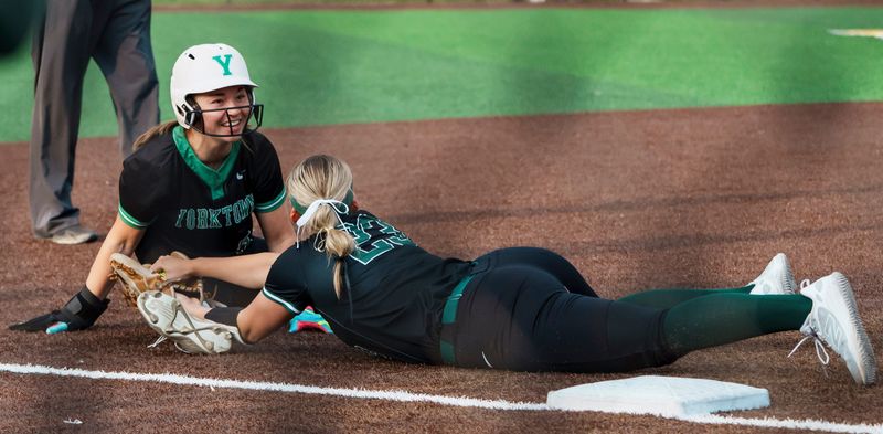 Yorktown’s Danae Caldwell is tagged out by Westfield’s Alyssa Ayers (23) as Westfield defeats Yorktown 3 to 0 Thursday, April 30, 2026, at the Monon Athletic Complex in Westfield.