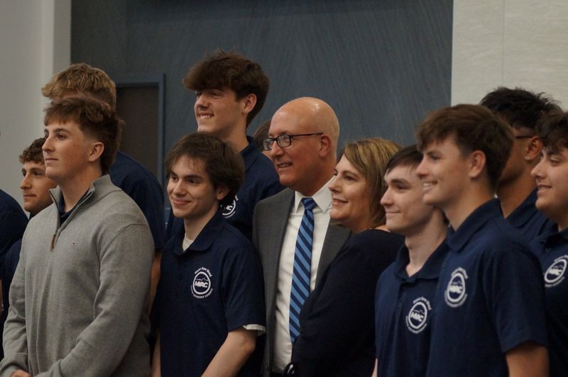 Mishawaka Mayor Dave Wood stands taking a picture with members of the Mayor's Youth Advisory Council after the State of the City address Thursday, April 30, 2026.