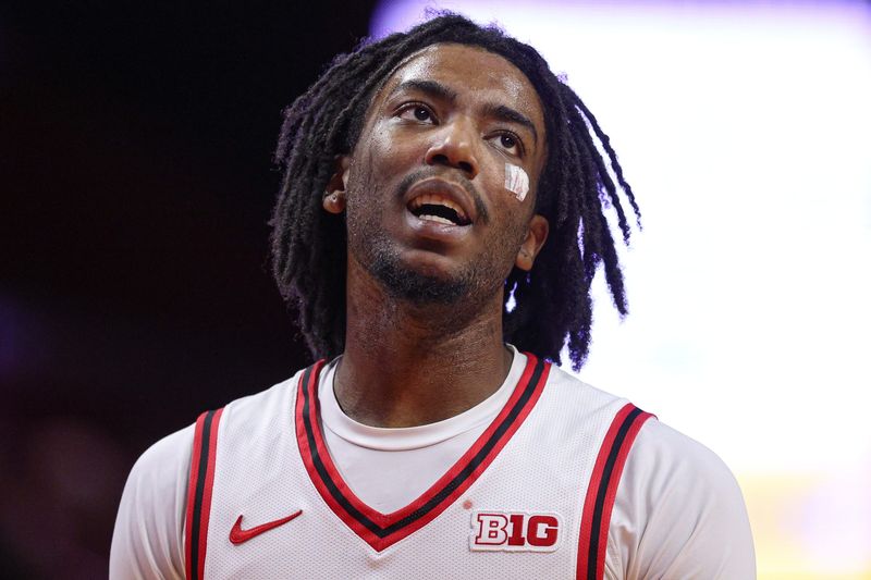 Dec 20, 2025; Piscataway, New Jersey, USA; Rutgers Scarlet Knights forward Bryce Dortch (4) reacts during the second half against the Penn Quakers at Jersey Mike's Arena. Mandatory Credit: Vincent Carchietta-Imagn Images