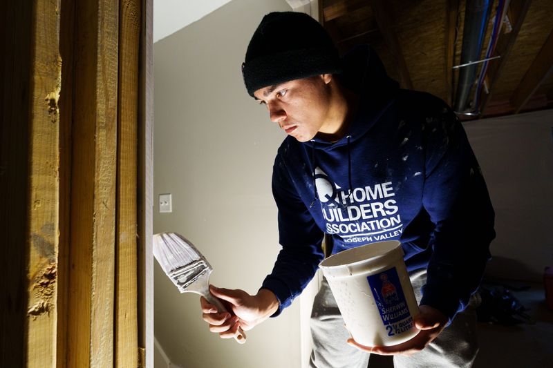 The South Bend Tribune's Student of the Week Weston Hoke, a senior at Adams High School, helps build a house as part of the South Bend Community School Corporation's Construction Technology program on Friday, May 1, 2026, in South Bend.