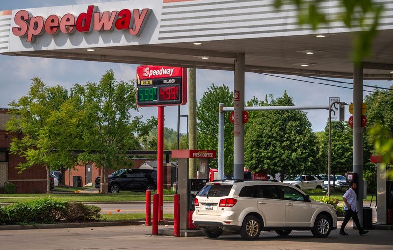 A man heads inside the Speedway on Third Street as a sign lists unleaded gas at $4.99 a gallon and diesel at $5.99 a gallon on Friday, May 1, 2026.