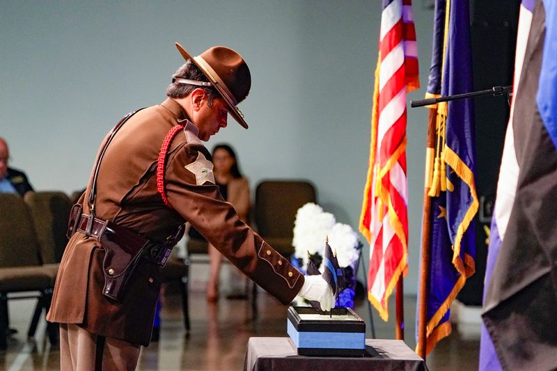 A memorial flag for fallen police officer Lieutenant Jimmie Van Wingate is placed during the 50th Annual Peace Officers Memorial Service on Friday, May 1, 2026, at the The Father's House Church in Indianapolis.