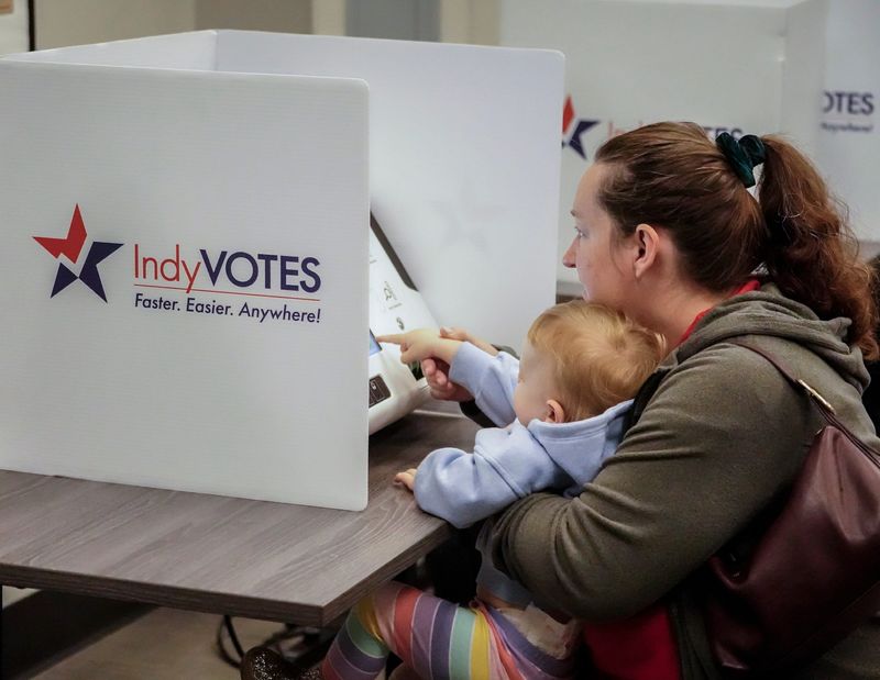 Voters arrive to cast their ballots on primary Election Day, Tuesday, May 5, 2026, at the Martin Luther King Community Center (MLK Center) in Indianapolis.