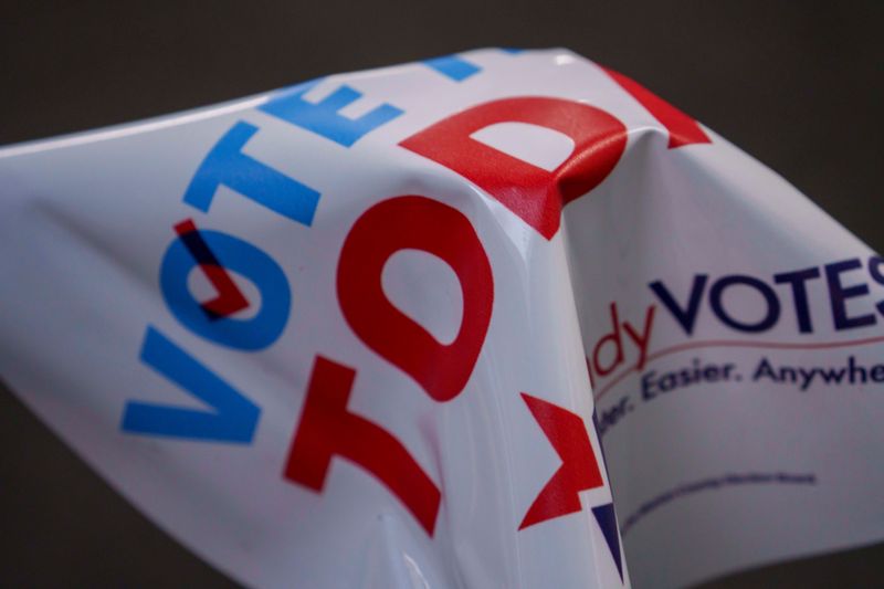 A voting sign folded over a post at the Garfield Park Burrelllo Center Tuesday, May 5, 2026, in Indianapolis.