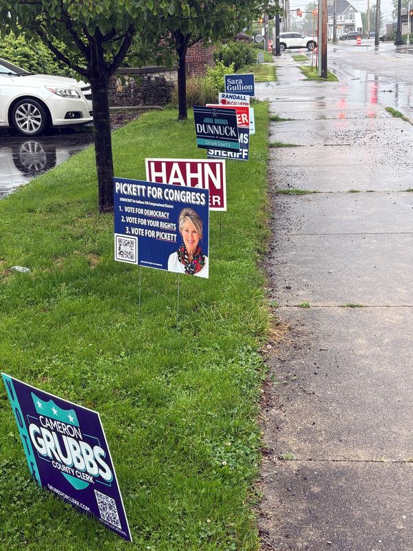 Campaign signs, largely those of Democratic candidates, are lined along Liberty Street outside Muncie Friends Church, 418 W. Adams St,, one of 26 vote centers for the primary election on May 4, 2026.