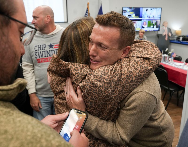 Blake Fiechter, the presumptive Republican nominee for Senate District 19, gets a hug after Fiechter is declared the winner of the primary during an election watch party Tuesday, May 5, 2026, at the Wells County Republican Headquarters in Bluffton.