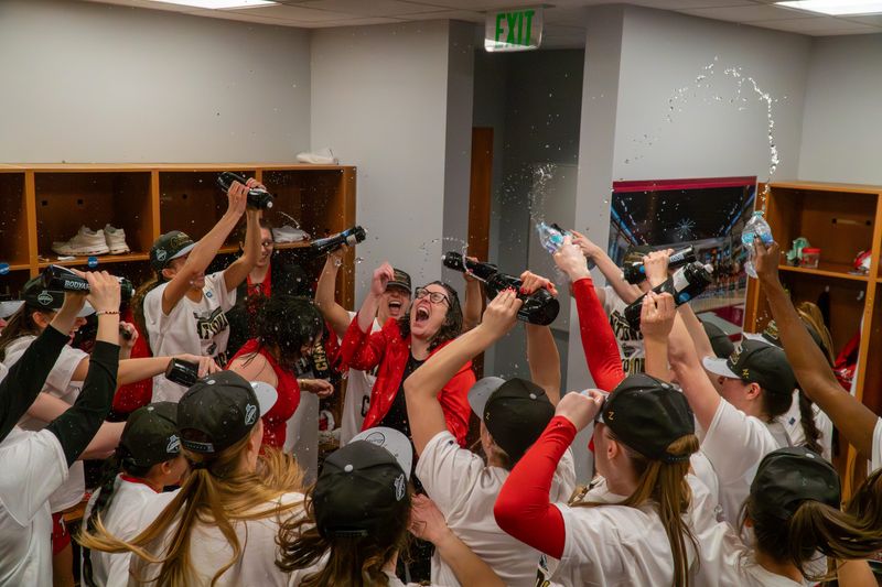 Denison head women's basketball coach Maureen Hirt gives out a scream in the locker room after winning the NCAA Division III national title in Salem, Va. on March 21, 2026.