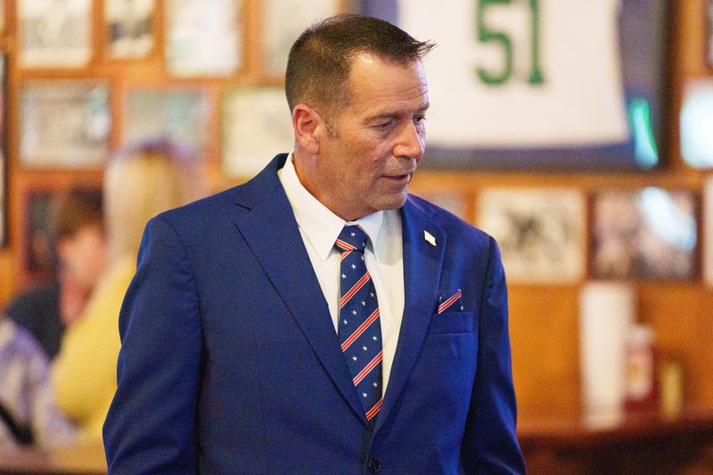 South Bend Chief of Police and St. Joseph County Sheriff candidate Scott Ruszkowski speaks with supporters at CJ's Pub as they wait for primary election results to come in on Tuesday, May 5, 2026, in South Bend.