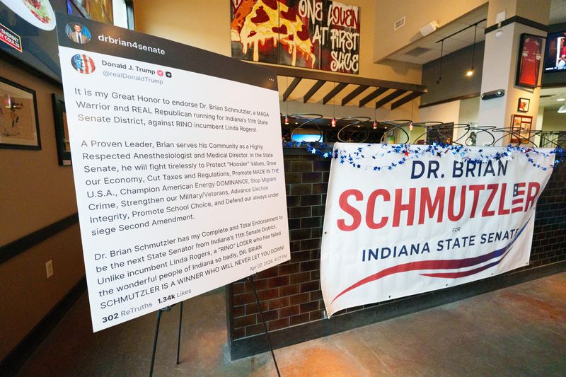 A social media post from President Donald Trump endorsing Brian Schmutzler, Republican candidate for Indiana State Senate District 11, is displayed at Schmutzler's primary election night watch party at JC's Coal Oven Pizza Co. on Tuesday, May 5, 2026, in Granger.