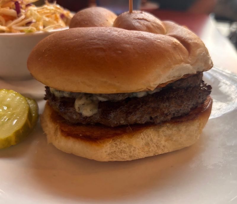 The Burgermerister, an Angus patty with bleu cheese crumbles, mushroom aioli and bacon onion jam, is pictured at Big Lug Canteen, 1435 E. 86th St. on April 30, 2026.