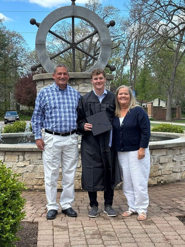 From left: Bryan Dillon, Andrew Dillon and Michelle Dillon take a picture after Andrew's graduation ceremony from Bethel University Saturday, May 2, 2026.
