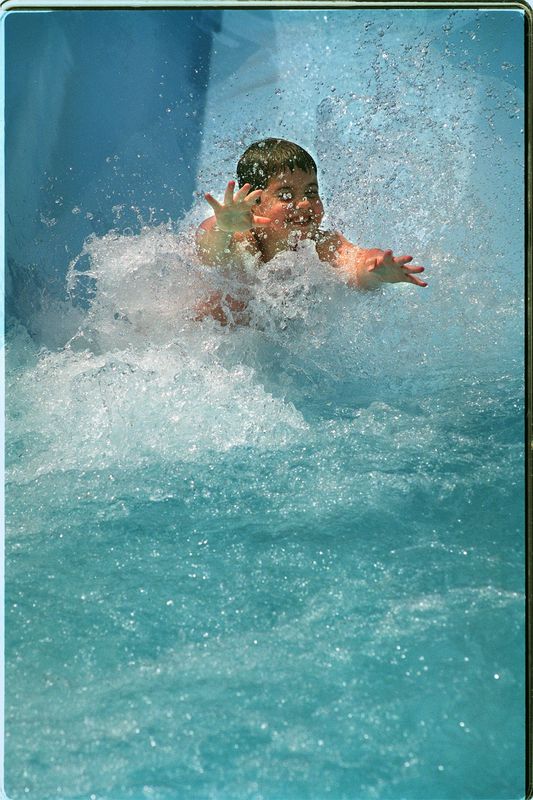 2003: Aaron Gibbons, of Charlestown, enjoys the water slide at Yawgoo Valley Water Park.