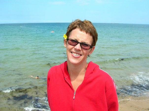 Catharine Rademacher smiles while enjoying a vacation in France.