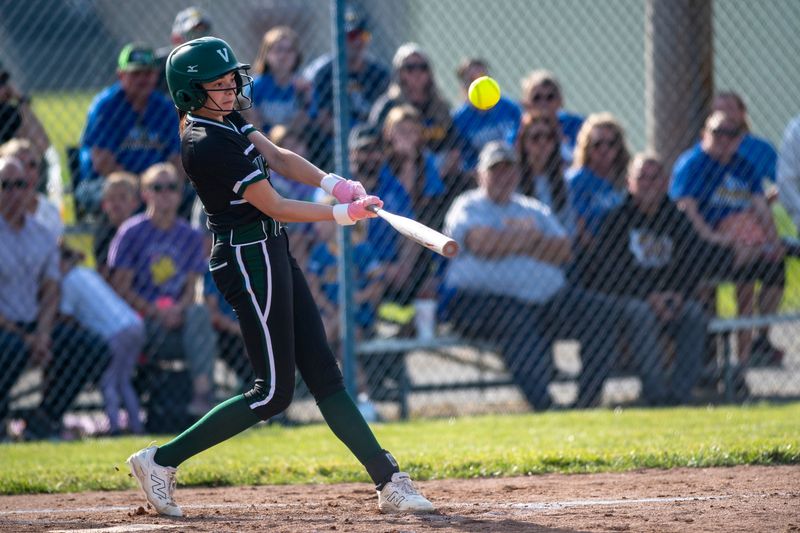 Vincennes Lincoln's Hadley Piper (0) hits as the Castle Lady Knights host the Vincennes Lincoln Lady Alices in Newburgh, Ind., Friday, May 8, 2026.