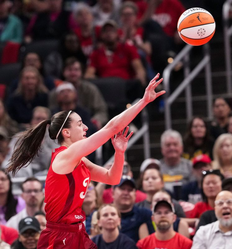 Indiana Fever guard Caitlin Clark (22) passes the ball Saturday, May 9, 2026, during the first half of the Fever’s season opener game at Gainbridge FIeldhouse in Indianapolis.
