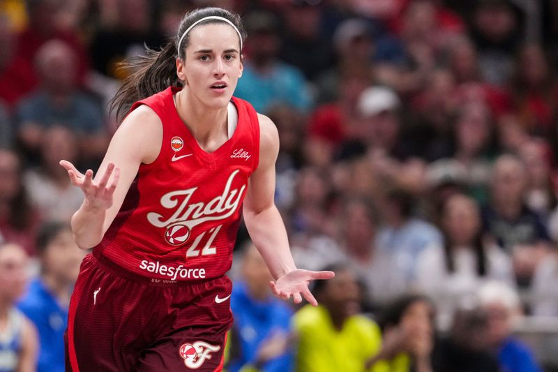 Indiana Fever guard Caitlin Clark (22) reacts to the action Saturday, May 9, 2026, during the first half of the Fever’s season opener game at Gainbridge Fieldhouse in Indianapolis.