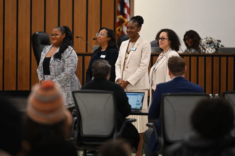 School board members vote on important issues affecting their school districts, including the hiring of a superintendent, and the district budget. Pictured above from left to right are Ashley Thomas, Indianapolis Public Schools commissioner for District 1; Deandra Thompson, IPS commissioner at large; Allissa Impink, IPS commissioner for District 4; and former commissioner Gayle Cosby.