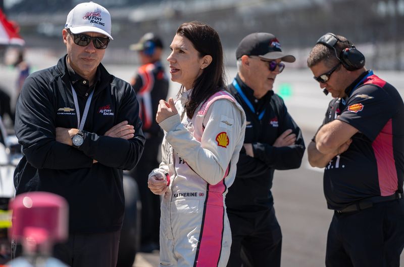 HMD Motorsports with AJ Foyt Racing driver Katherine Legge (11) talks with a crew member Tuesday, May 12, 2026, during practice for the 110th running of the Indianapolis 500 at Indianapolis Motor Speedway.