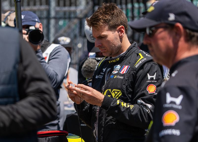 Andretti Global driver Will Power (26) prepares his ear protection Tuesday, May 12, 2026, during practice for the 110th running of the Indianapolis 500 at Indianapolis Motor Speedway.