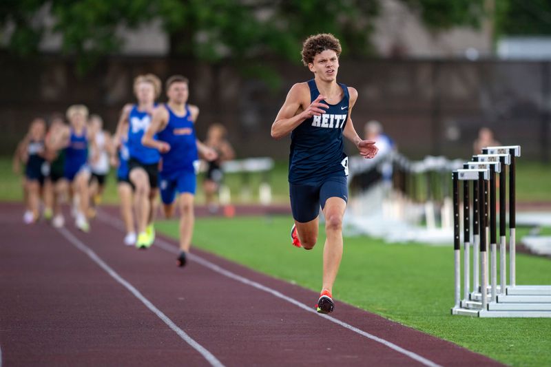 Runners compete in the 800 meter run during the SIAC Boys Track and Field meet at Central High School in Evansville, Ind., Thursday, May 14, 2026.