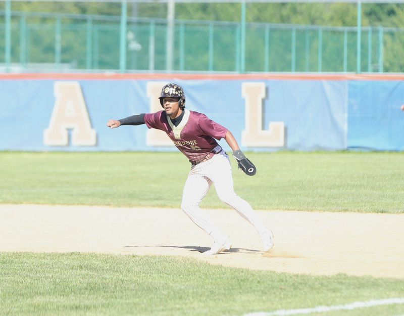 Brandywine senior Kaeden Warfield gets a secondary lead off of first base during an MHSAA baseball game at Edwardsburg High School Thursday, May 14, 2026.