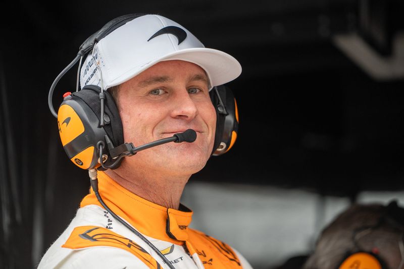 Arrow McLaren driver Ryan Hunter-Reay (31) smiles inside his pit box Friday, May 15, 2026, during practice for the 110th running of the Indianapolis 500 at Indianapolis Motor Speedway.