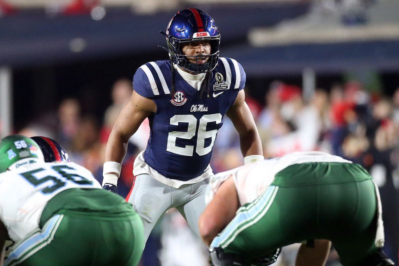 Dec 20, 2025; Oxford, MS, USA; Mississippi Rebels linebacker Tahj Chambers (26) waits for the snap during the fourth quarter against the Tulane Green Wave at Vaught-Hemingway Stadium. Mandatory Credit: Petre Thomas-Imagn Images