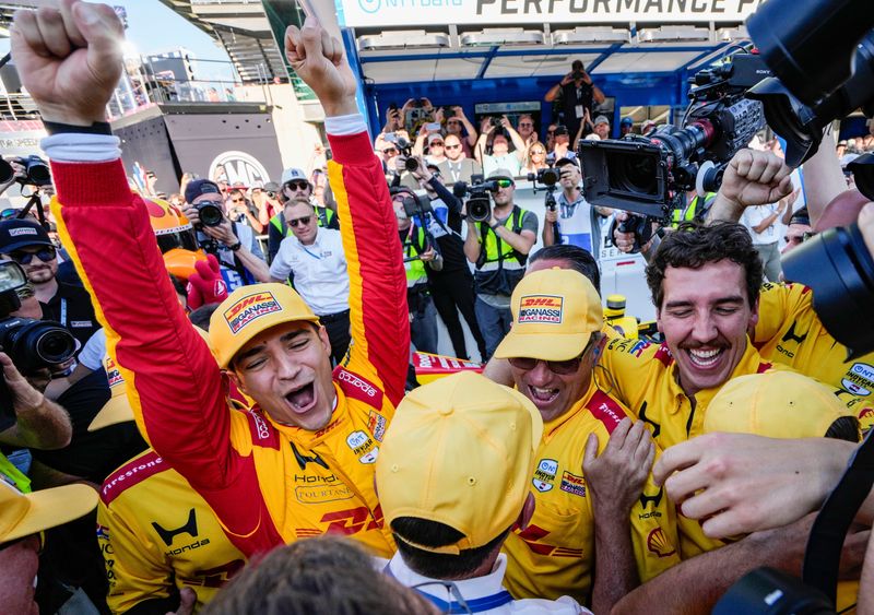 Chip Ganassi Racing driver Alex Palou (10) celebrates winning pole position Sunday, May 17, 2026, during qualifying for the 110th running of the Indianapolis 500 at Indianapolis Motor Speedway.