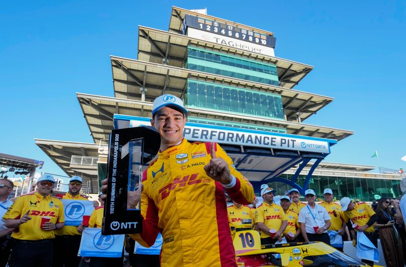 Chip Ganassi Racing driver Alex Palou (10) celebrates winning pole position Sunday, May 17, 2026, during qualifying for the 110th running of the Indianapolis 500 at Indianapolis Motor Speedway.