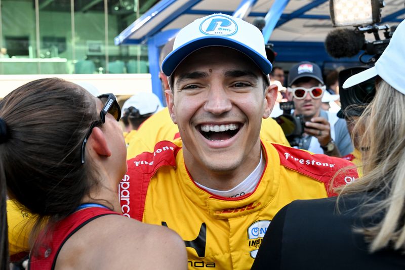 Chip Ganassi Racing driver Alex Palou (10) celebrates after earning the pole position Sunday, May 17, 2026, during qualifying for the 110th running of the Indianapolis 500 at Indianapolis Motor Speedway.