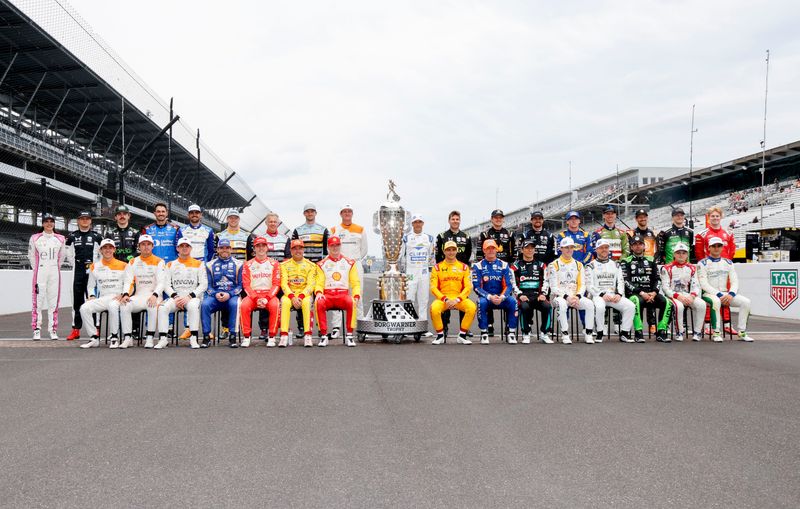Drivers pose with the Borg Warner trophy Monday, May 18, 2026, ahead of practice for the 110th running of the Indianapolis 500 at Indianapolis Motor Speedway.
