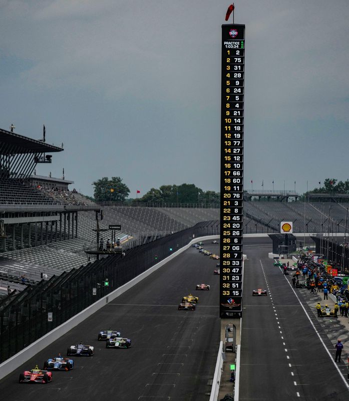IndyCars drive down the front stretch Monday, May 18, 2026, during practice for the 110th running of the Indianapolis 500 at Indianapolis Motor Speedway.