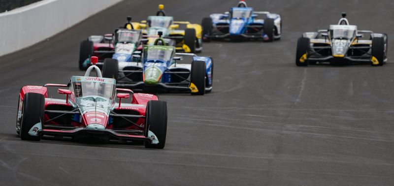 Ed Carpenter Racing driver Ed Carpenter (33) drives with a pack of cars Monday, May 18, 2026, during practice for the 110th running of the Indianapolis 500 at Indianapolis Motor Speedway.