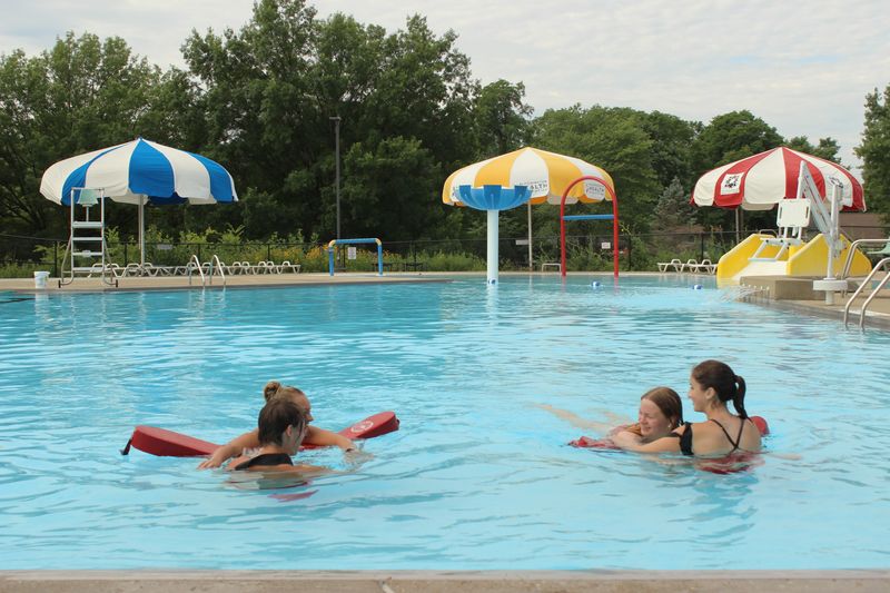 Parks staff are seen in Mills Pool in 2024 during an in-service training day. Mills Pool will not open on May 23, 2026, because a leak has to be fixed first.